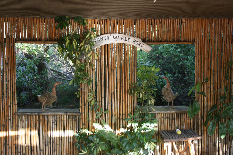 Rustic reed-and-bamboo interior at The Bush Pub